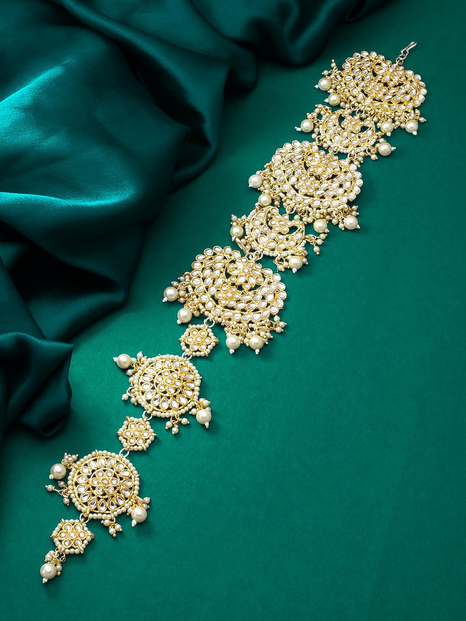 Vibrant Green Kundan Jhumka Earrings – A Symbol of Grace and Beauty