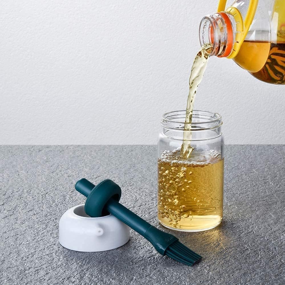 2 IN 1 OIL DISPENSER CONDIMENT JAR WITH SILICONE BRUSH ? Convenient Oil and Condiment Dispenser with Built-In Brush

