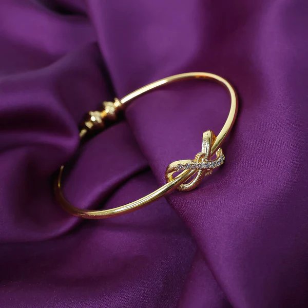 Elegant Knot Design Bangles with Stone Detailing  Gold Plated Bangles for Women, Perfect for Weddings & Formal Occasions